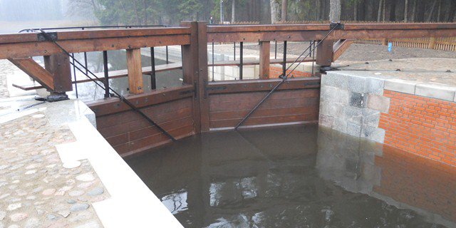 Renovation of the Perkuć weir and flood-gate with road bridges at 63+000 km of the Augustów Canal.
